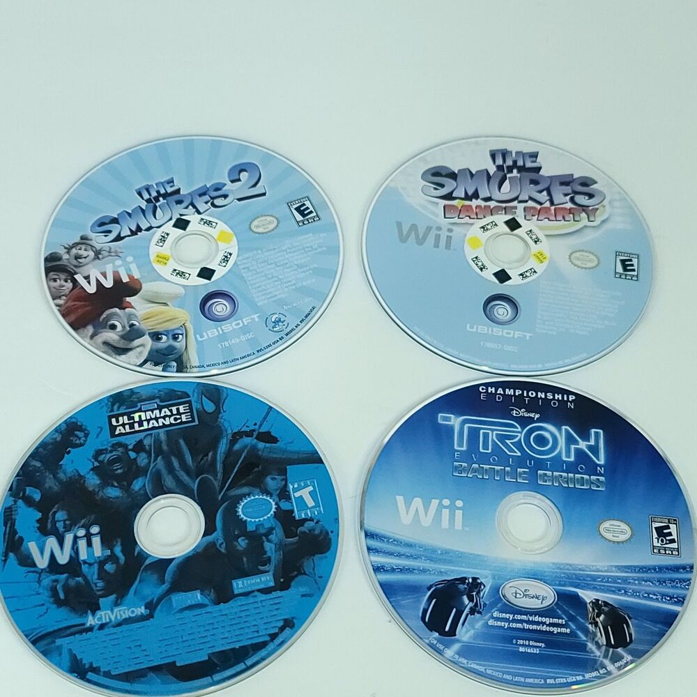 Nintendo Wii Games Lot of 4 Bundle Ultimate Alliance Tron Smurfs 2 Dance Party